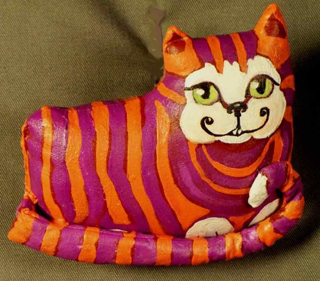cheshire cat 2010. Art: The Cheshire Cat by