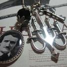 Art: Edgar A. Poe  Altered Art Charm Necklace  by Artist Lisa  Wiktorek
